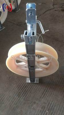 Güvenli 660x110mm Kasnak Boyutu ve 20-50KN Nominal Yük Fiber Optik Topraklama Kablosu Kurulumu için Metalik Olmayan Astarlı Profesyonel OPGW Kablo Çekme Bloğu